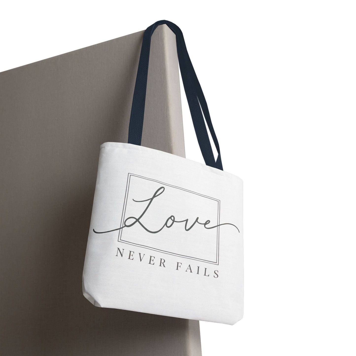 Love Never Fails Tote Bag