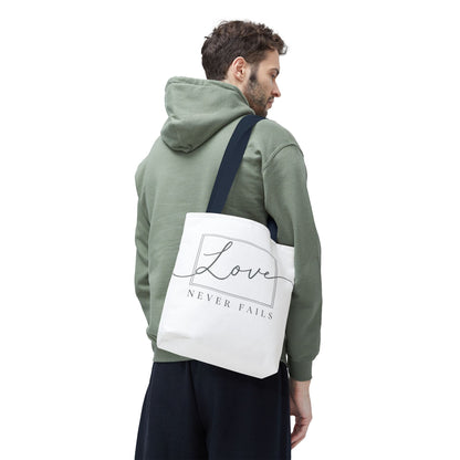 Love Never Fails Tote Bag