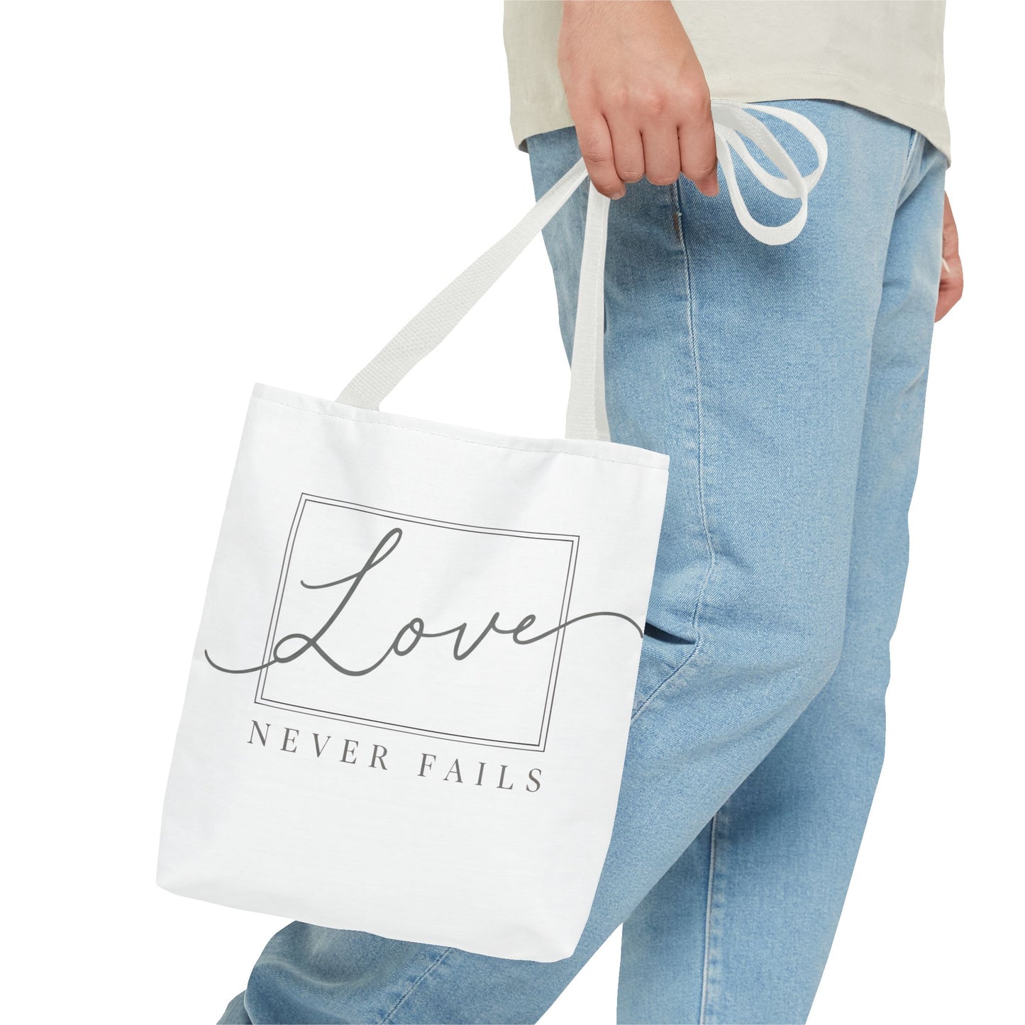 Love Never Fails Tote Bag