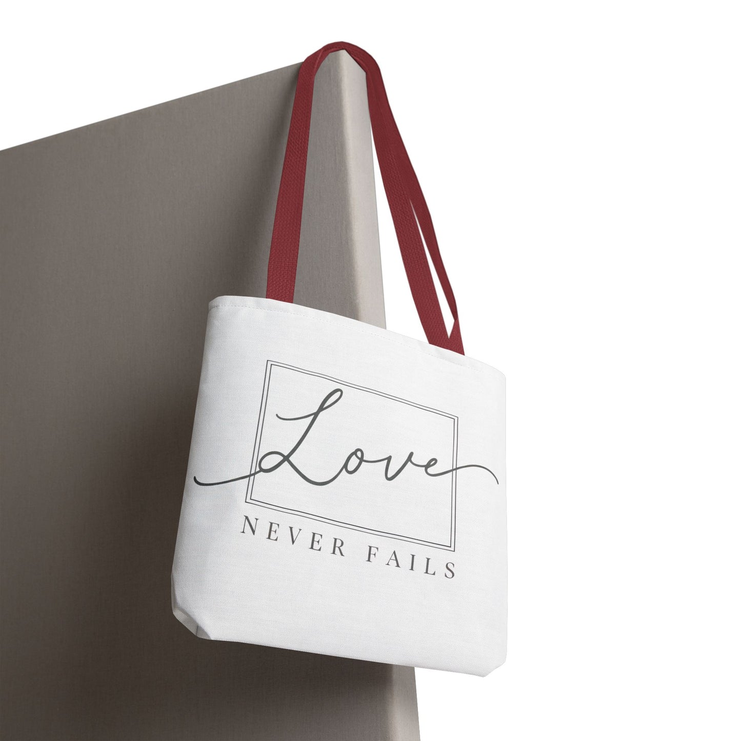 Love Never Fails Tote Bag
