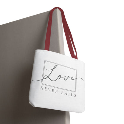 Love Never Fails Tote Bag