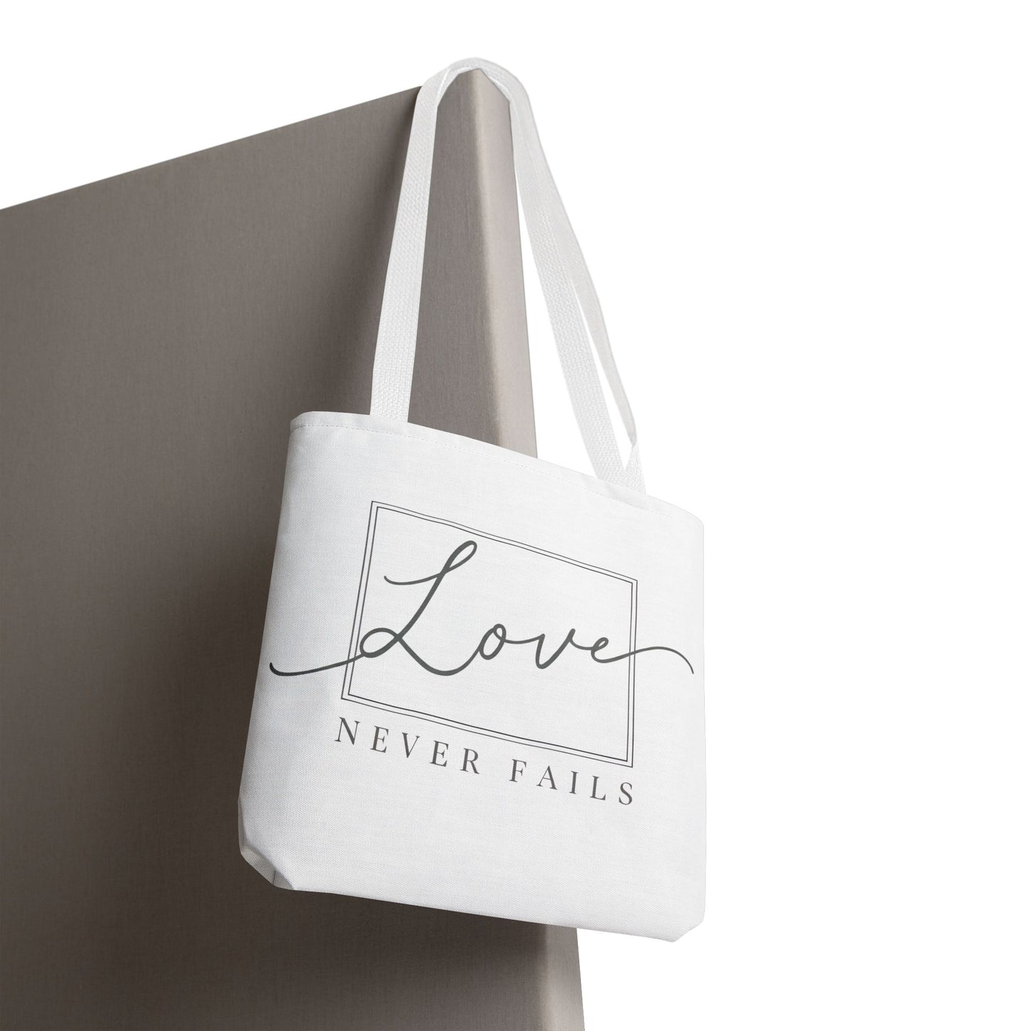 Love Never Fails Tote Bag