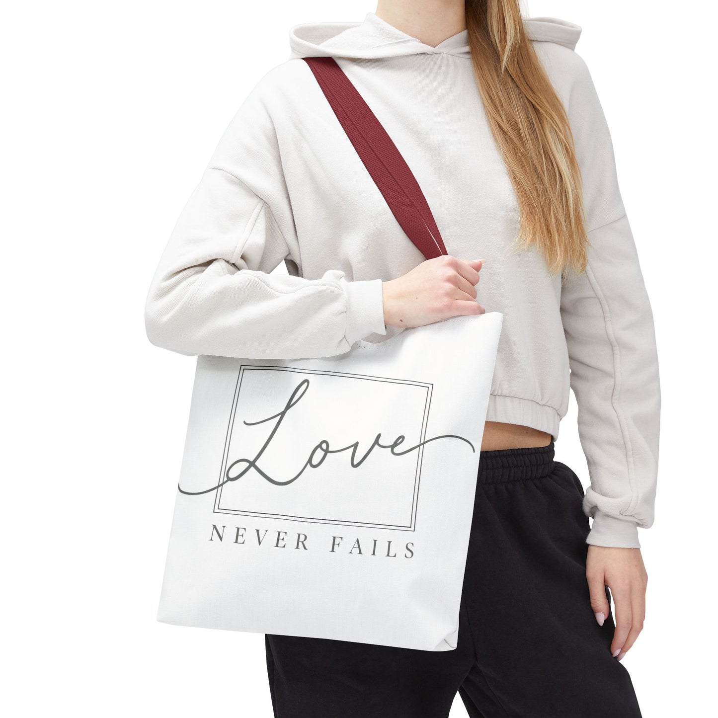 Love Never Fails Tote Bag