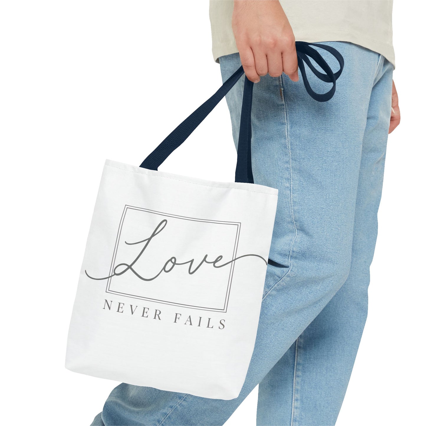 Love Never Fails Tote Bag