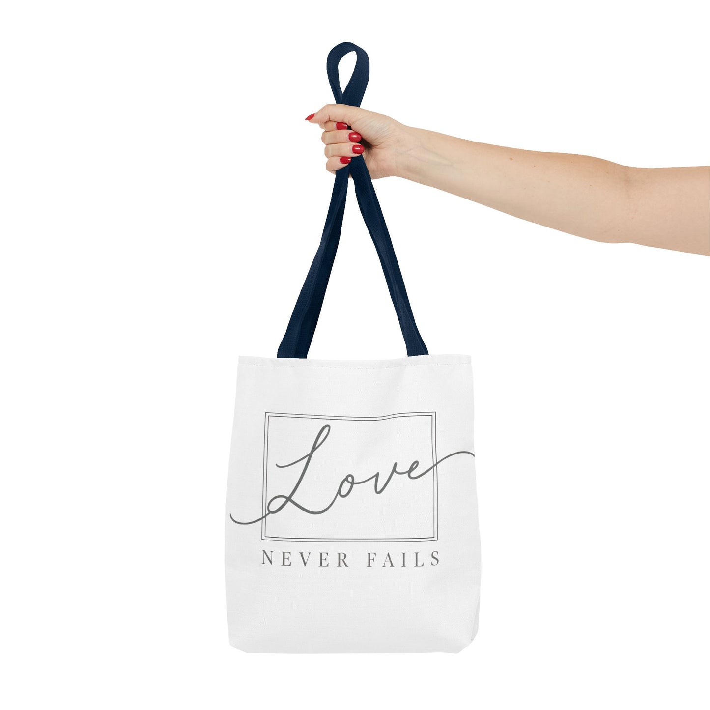 Love Never Fails Tote Bag