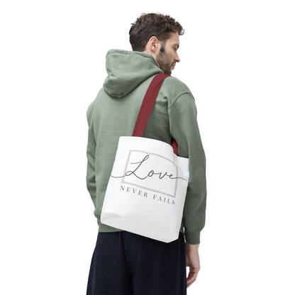 Love Never Fails Tote Bag