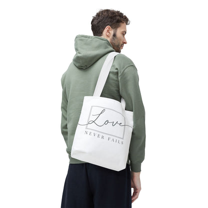 Love Never Fails Tote Bag