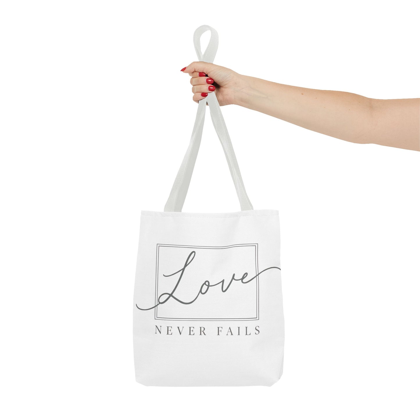 Love Never Fails Tote Bag