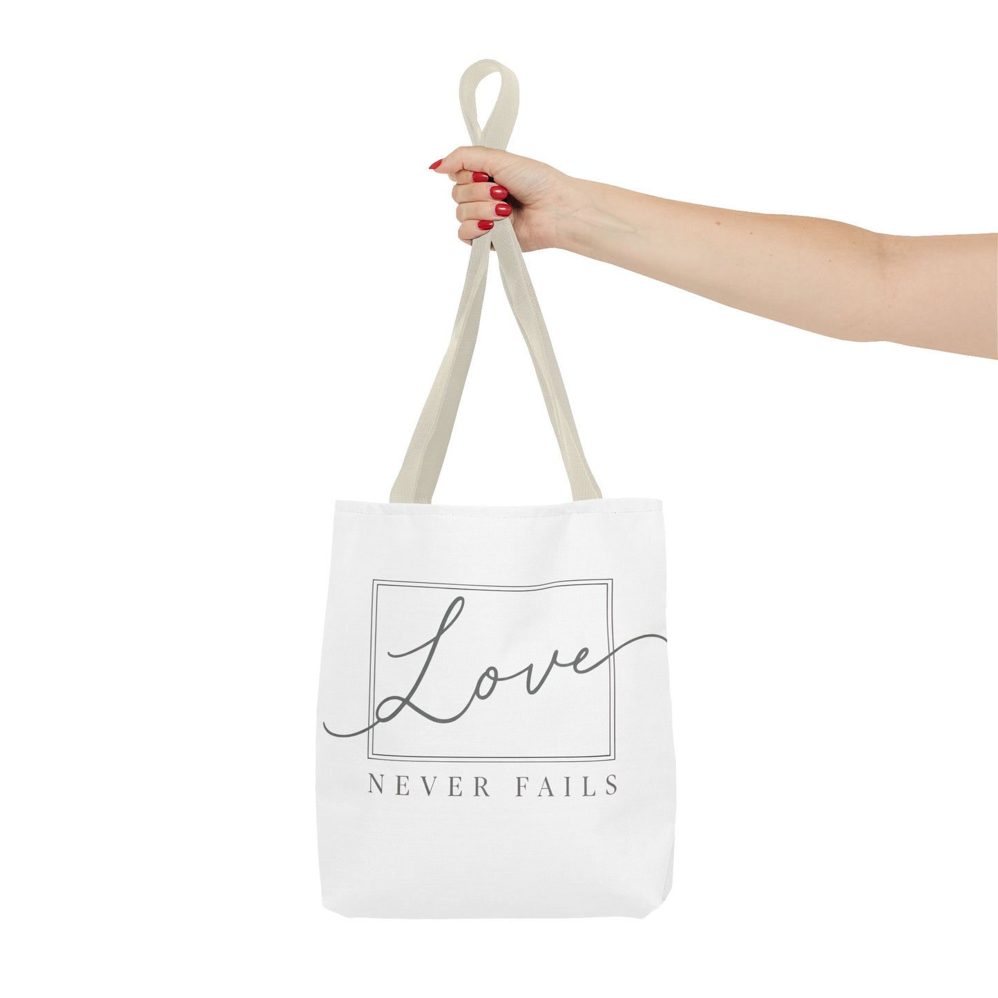 Love Never Fails Tote Bag