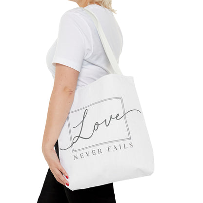 Love Never Fails Tote Bag