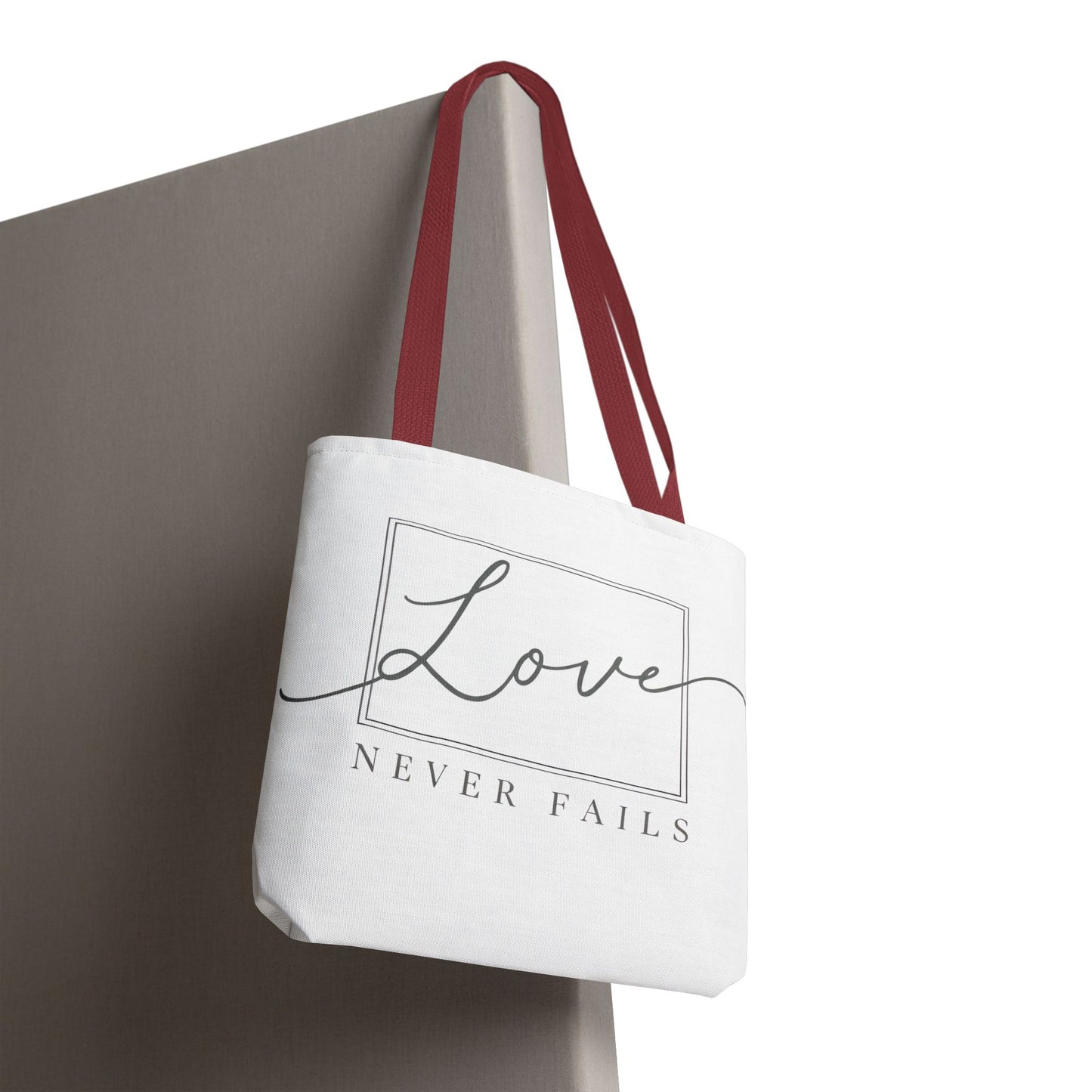 Love Never Fails Tote Bag