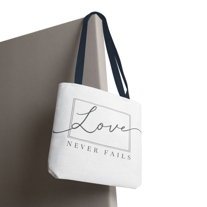 Love Never Fails Tote Bag