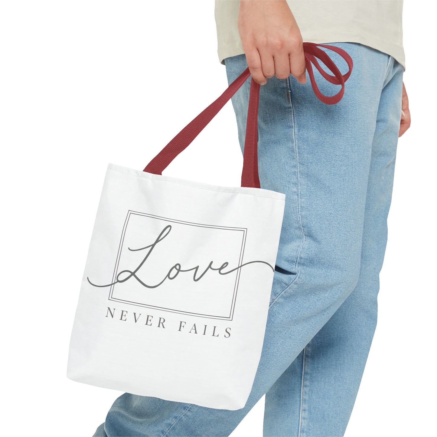 Love Never Fails Tote Bag